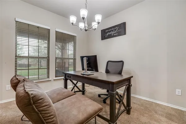 a view of a dining room with furniture