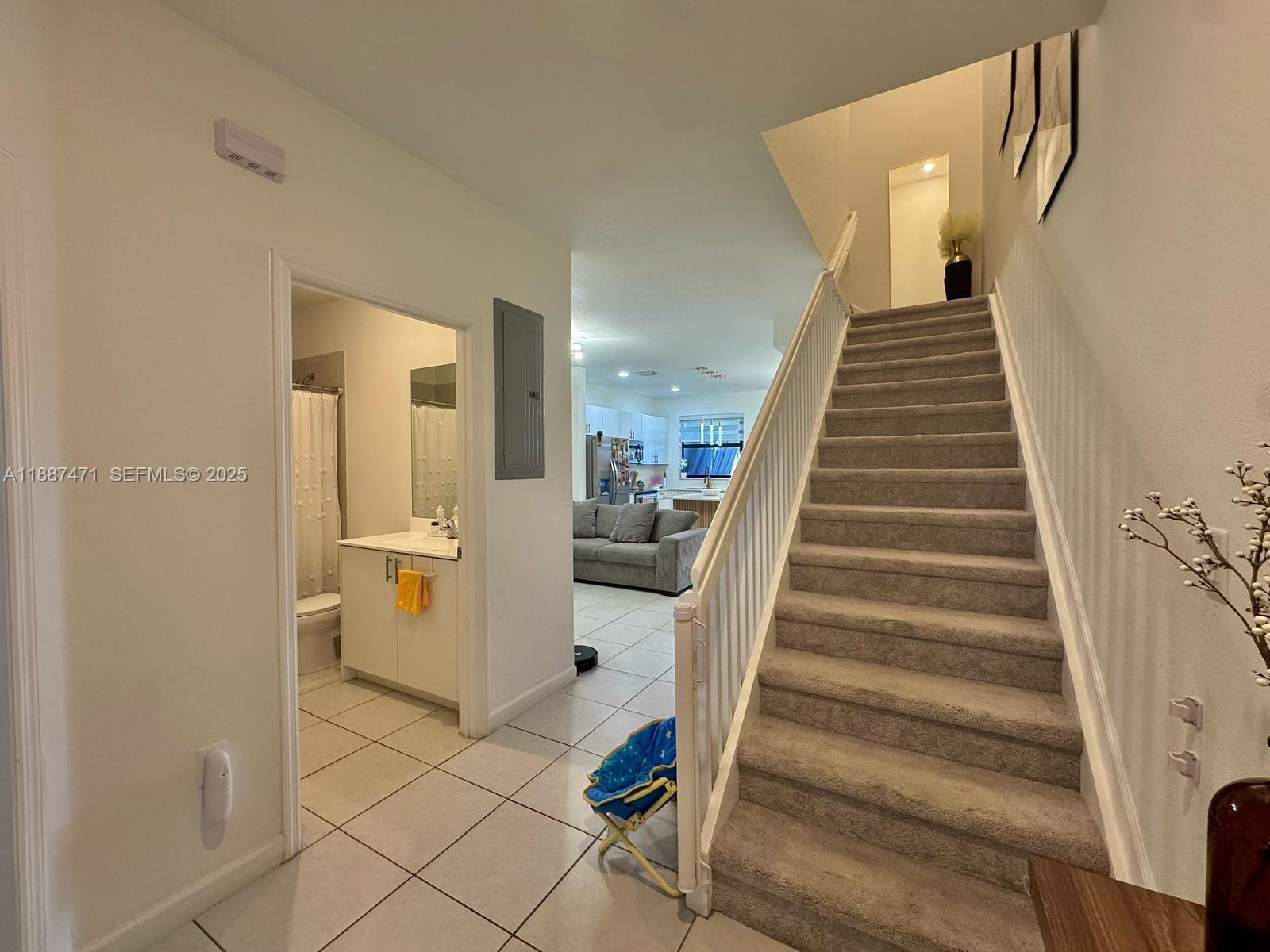 23541 Southwest 127th Place Homestead, FL 33032 - Photo 6 of 13 a view of entryway and hall with wooden floor