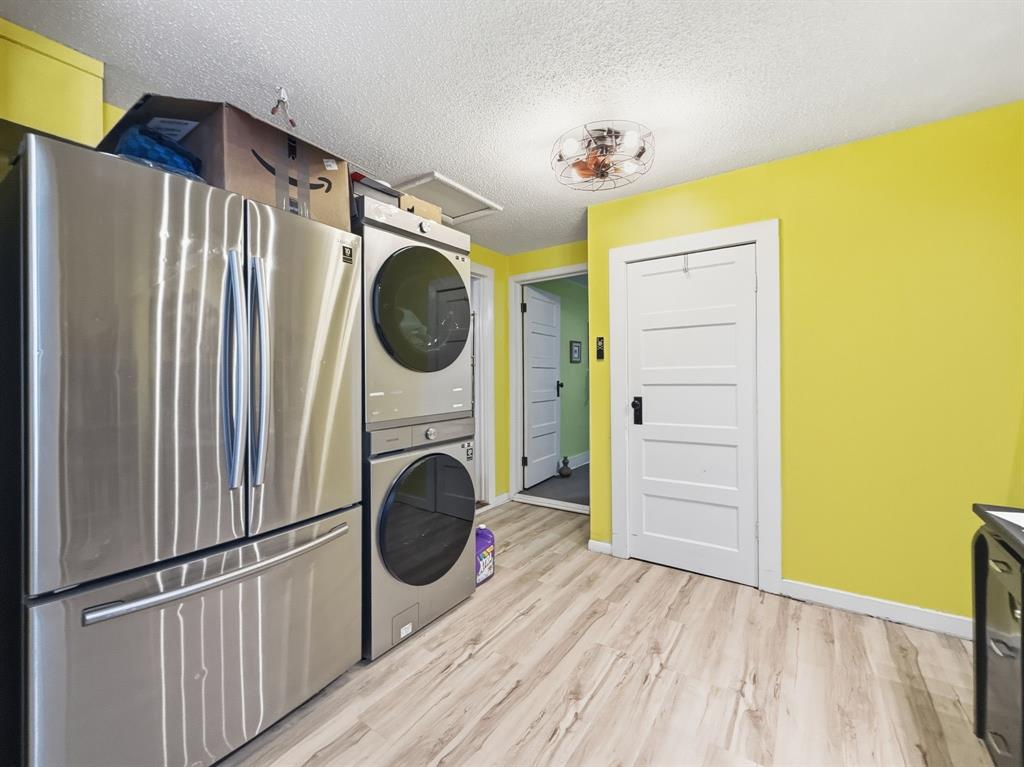 112 East Hoard Street Hamilton, TX 76531 - Photo 11 of 26 a view of a hallway with washer and dryer