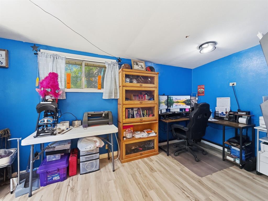 112 East Hoard Street Hamilton, TX 76531 - Photo 13 of 26 a view of a workspace with furniture