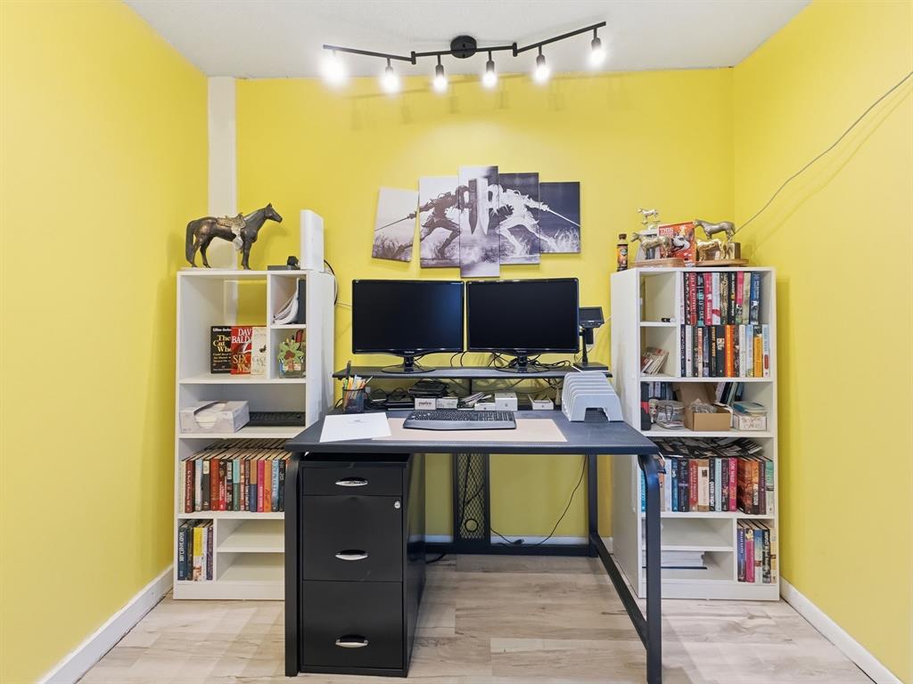 112 East Hoard Street Hamilton, TX 76531 - Photo 10 of 26 a view of a workspace with furniture