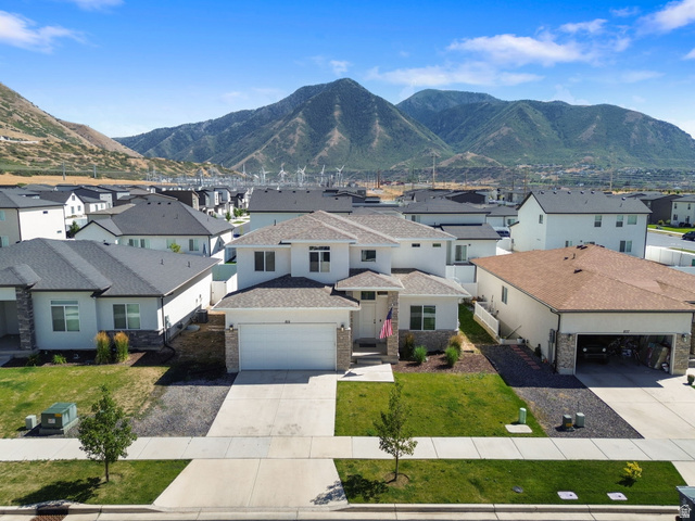 815 West Powderwood Lane Mapleton, UT 84664 - Photo 32 of 34 Contemporary residential property with a white exterior and a stone facade accent