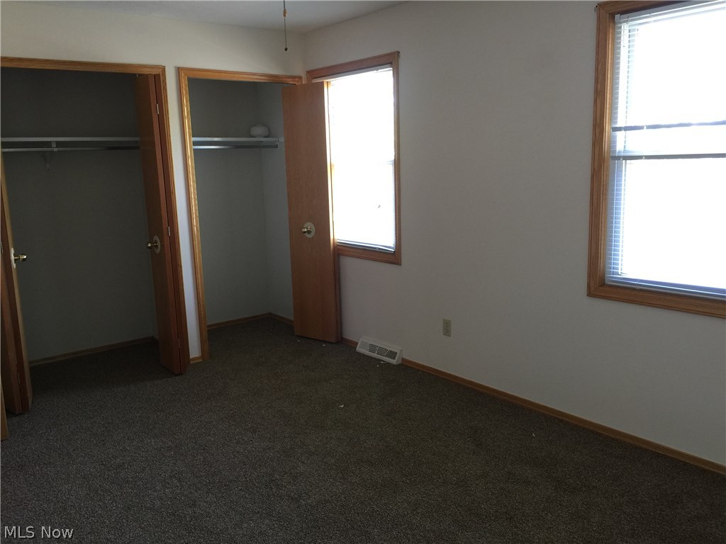6330-6332 Manchester Road Parma, OH 44129 - Photo 23 of 24 Master bedroom with 2 large side by side closets.