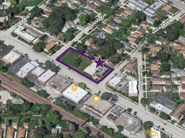 an aerial view of a city with lots of residential buildings