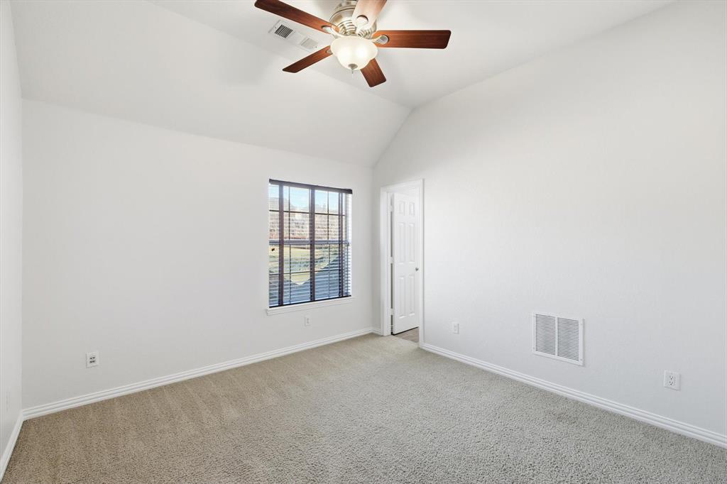 9728 Sam Bass Trail Fort Worth, TX 76244 - Photo 22 of 34 Upstairs bedroom 3 with ensuite