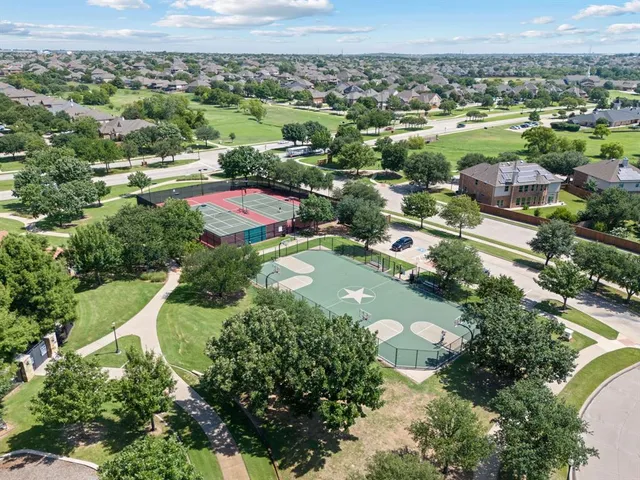 an aerial view of a city with lots of residential buildings