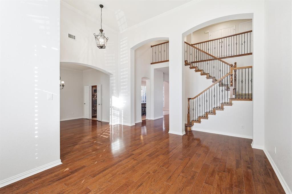 9728 Sam Bass Trail Fort Worth, TX 76244 - Photo 5 of 34 Formal area living room, with view of stairs