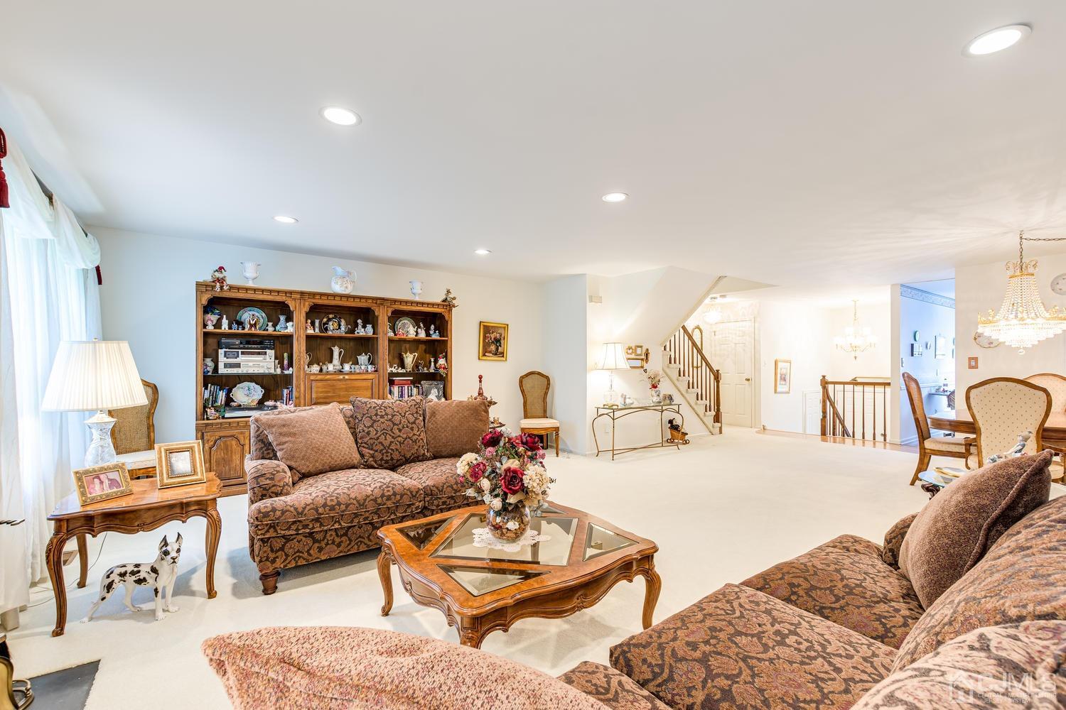 4303 Springbrook Drive Edison, NJ 08820 - Photo 15 of 40 a living room with furniture and a wooden floor