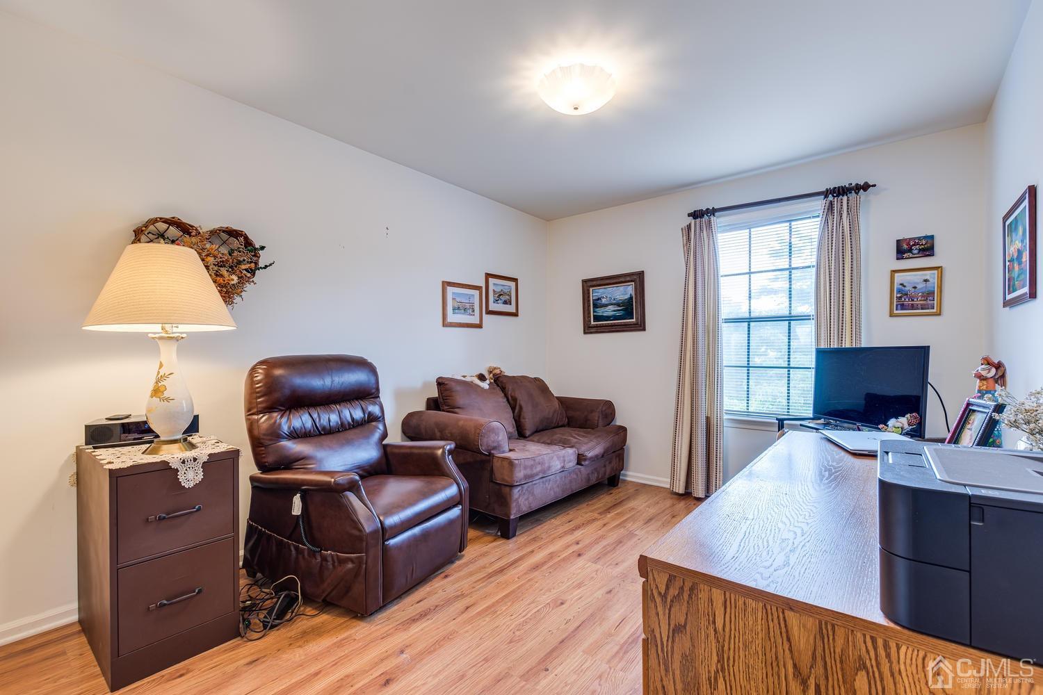 4303 Springbrook Drive Edison, NJ 08820 - Photo 30 of 40 a living room with furniture and a window