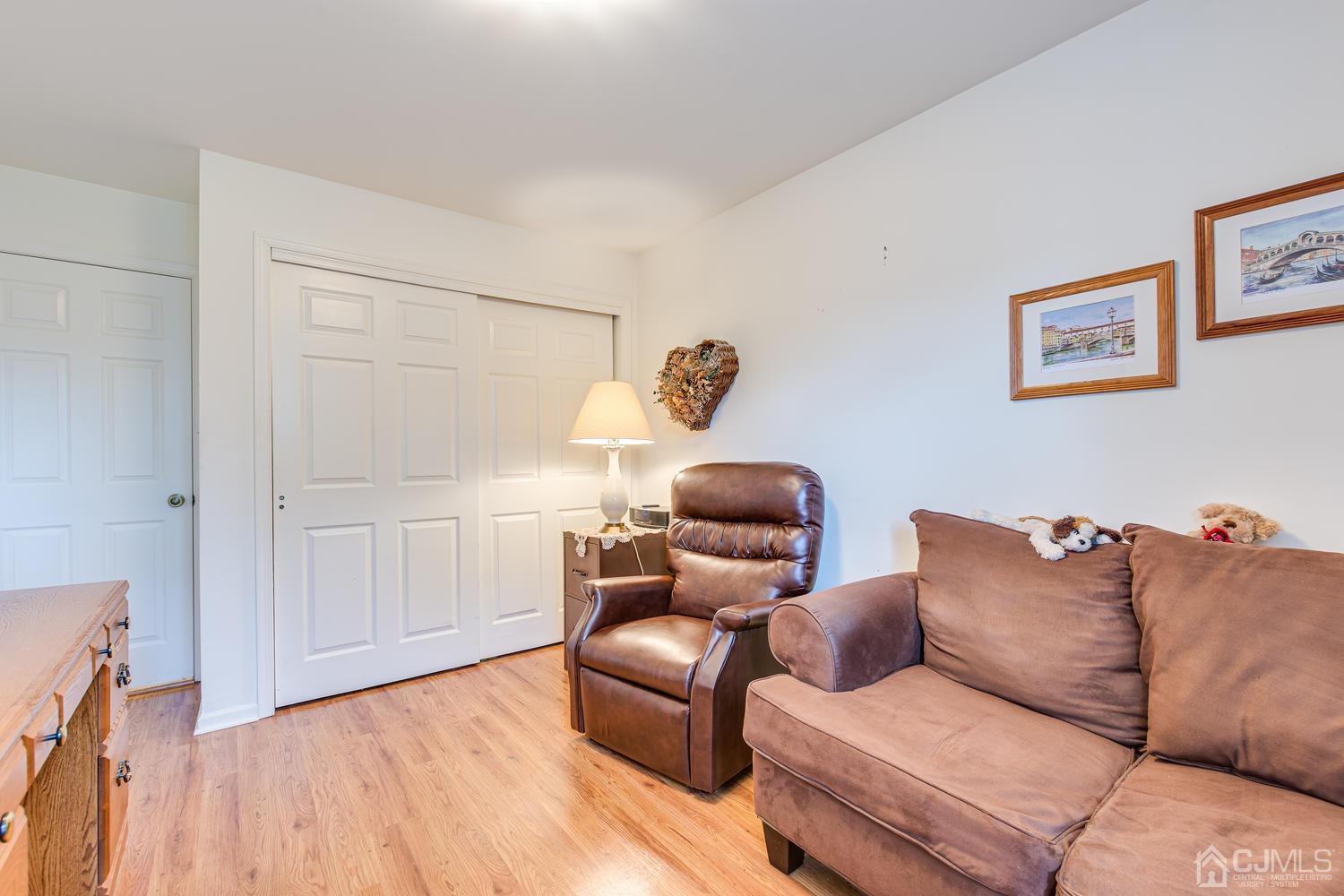 4303 Springbrook Drive Edison, NJ 08820 - Photo 31 of 40 a living room with furniture and a couch