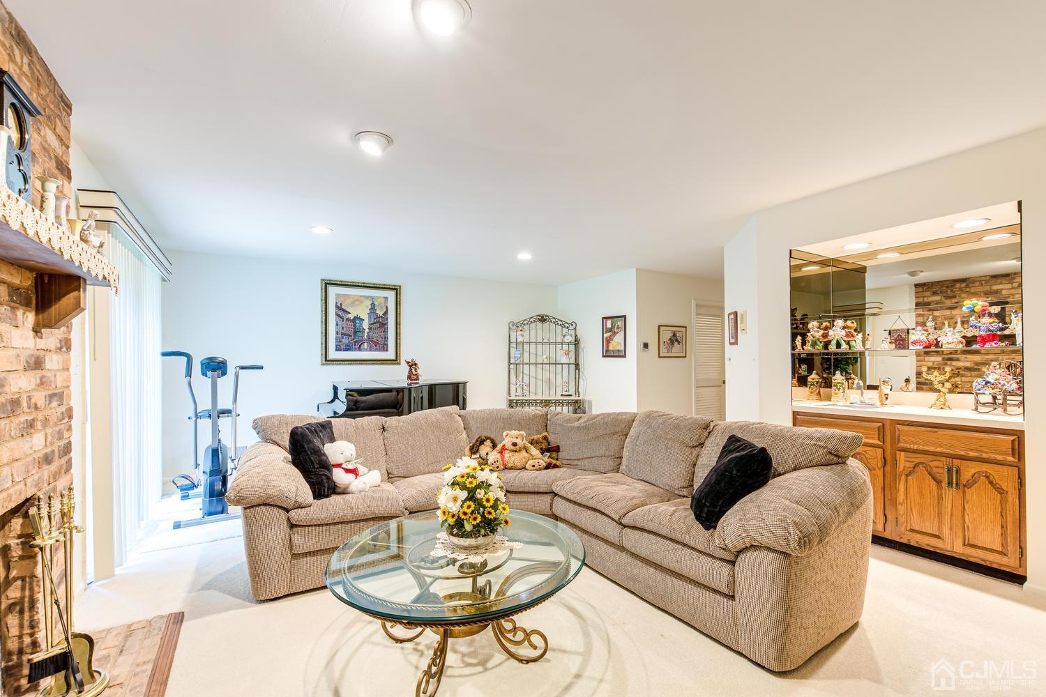 4303 Springbrook Drive Edison, NJ 08820 - Photo 35 of 40 a living room with furniture kitchen and a table