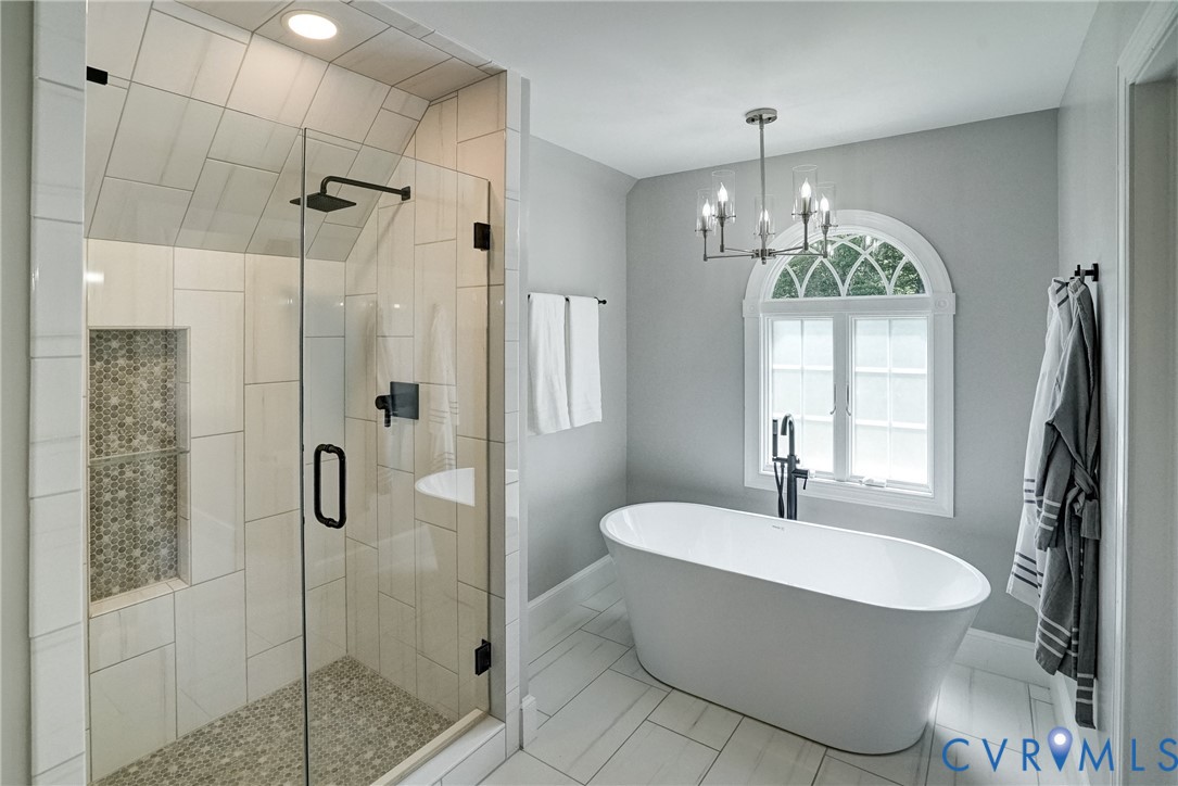1295 Hermitage Road Manakin-Sabot, VA 23103 - Photo 45 of 55 a bathroom with a bathtub shower sink and mirror