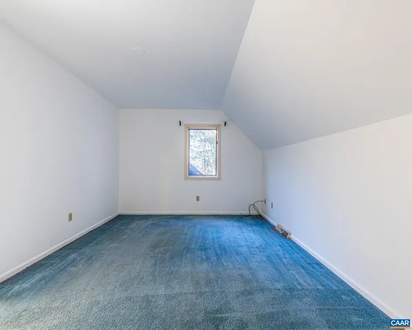 an empty room with window