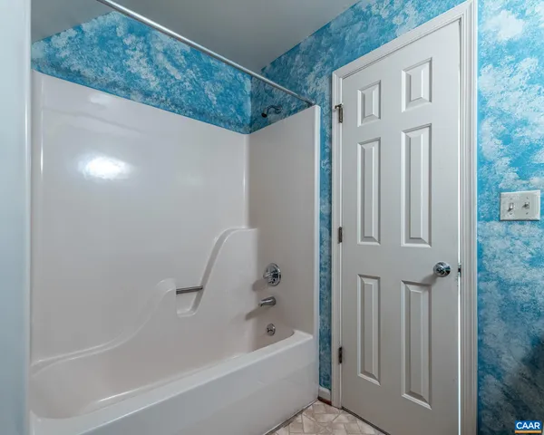 a bathroom with a bathtub