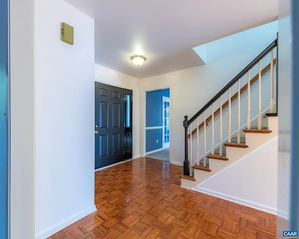 a view of an entryway with stairs