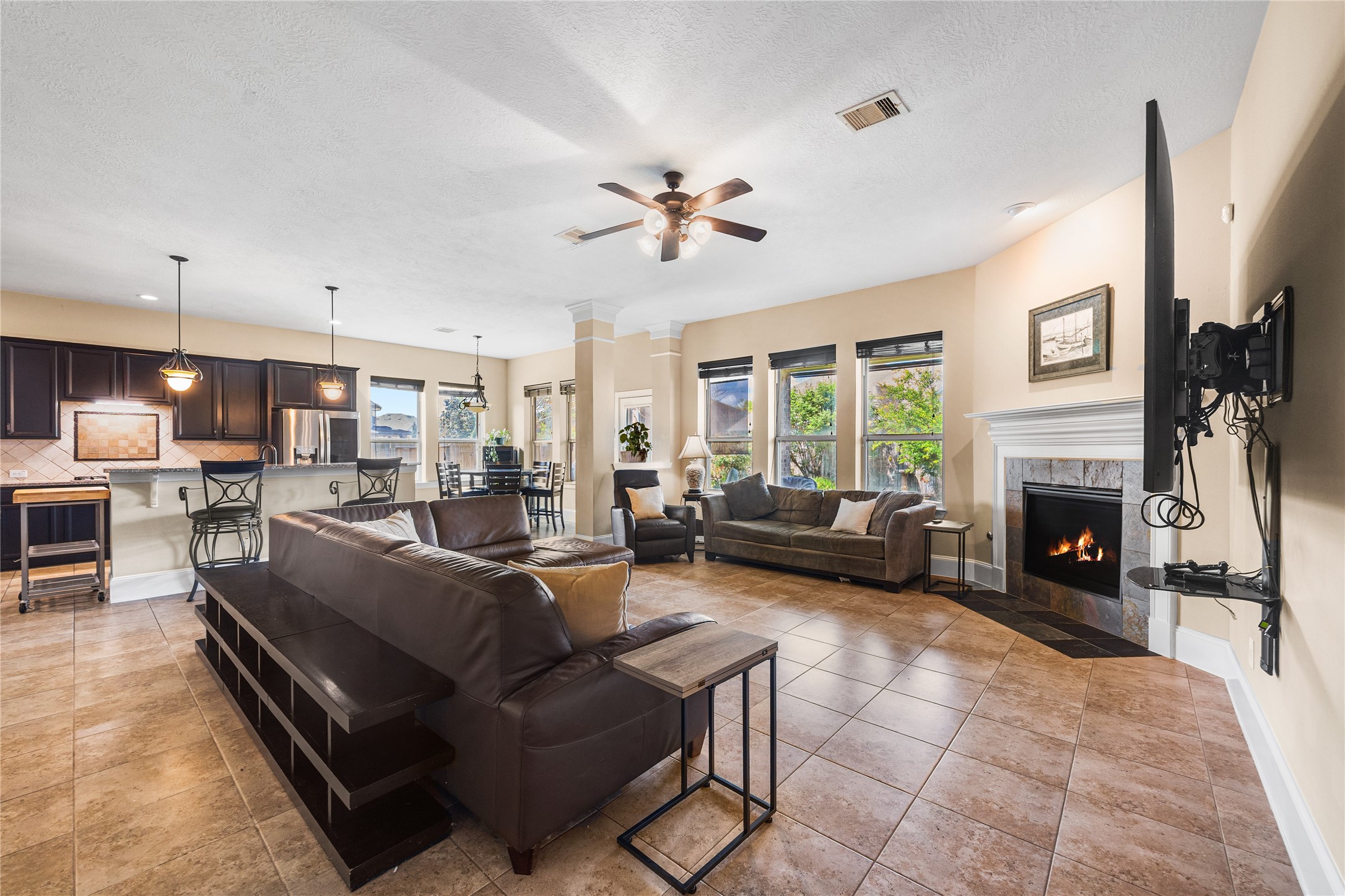 31311 Brighton Brook Lane Spring, TX 77386 - Photo 16 of 47 a living room with furniture fireplace and a large window