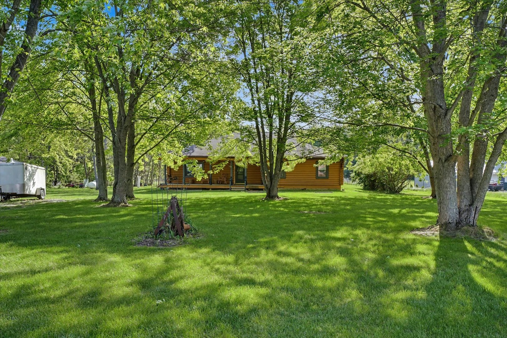 2431 North 1450 East Road Mansfield, IL 61854 - Photo 8 of 78 a view of a backyard with large trees