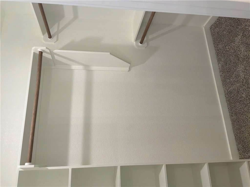 2834 Messenger Way Bryan, TX 77803 - Photo 18 of 24 a view of walk in closet with empty racks