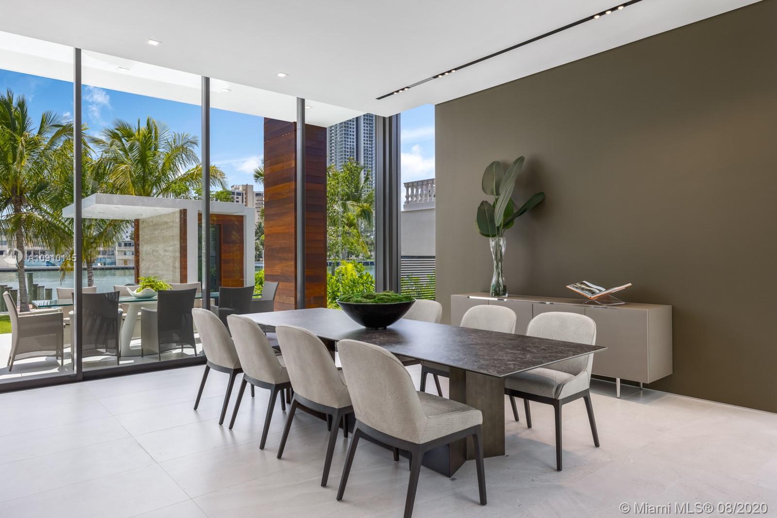 6493 Allison Road Miami Beach, FL 33141 - Photo 9 of 41 a view of a dining room with furniture window and outside view