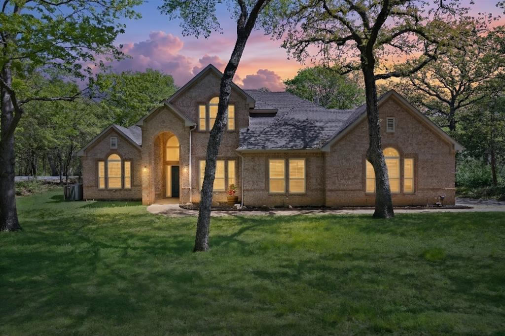 a house view with a garden space