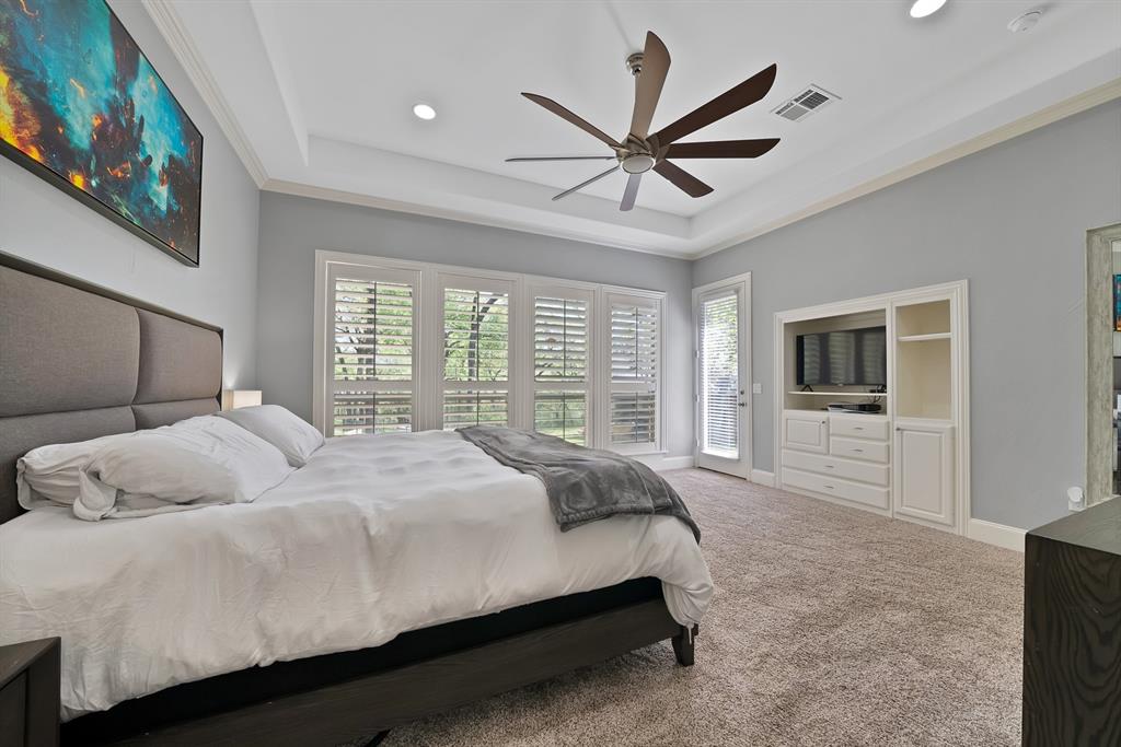 621 Diamond Point Drive Oak Point, TX 75068 - Photo 18 of 40 a bedroom with a large bed and a window