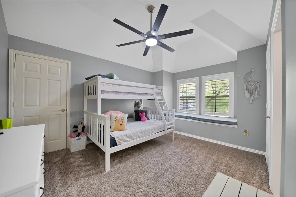 621 Diamond Point Drive Oak Point, TX 75068 - Photo 29 of 40 a bed room with a bed and window