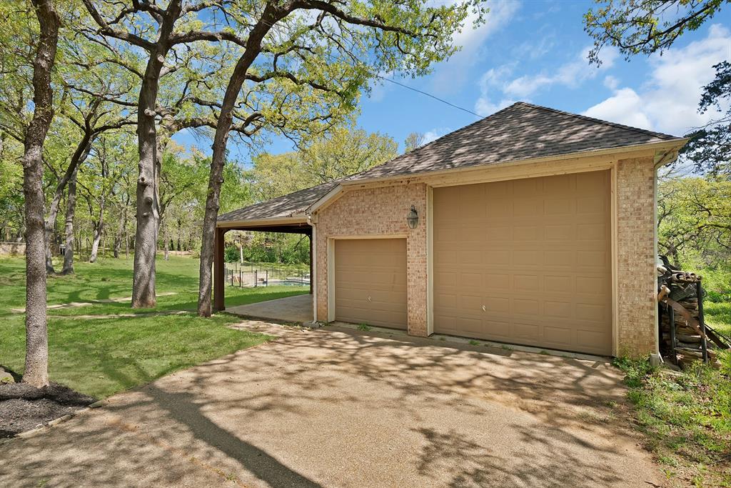 621 Diamond Point Drive Oak Point, TX 75068 - Photo 30 of 40 a view of a house with a yard