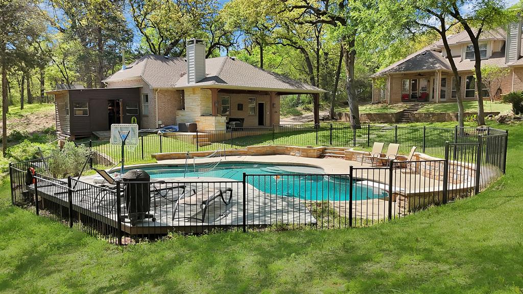 621 Diamond Point Drive Oak Point, TX 75068 - Photo 37 of 40 a view of a house with a yard and sitting area