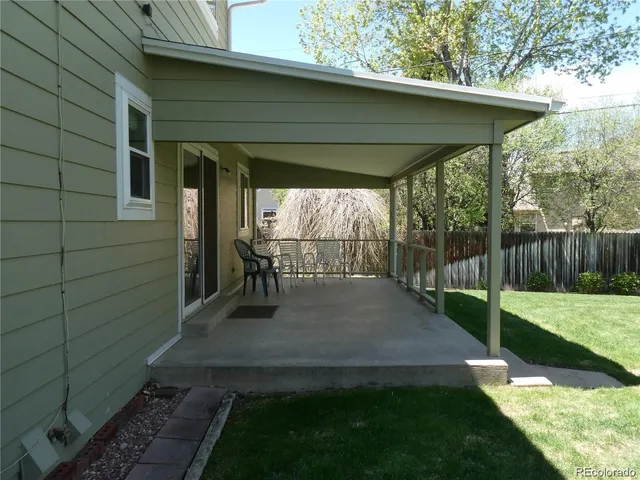 a view of backyard with green space