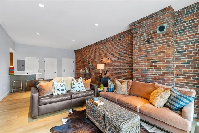 a living room with furniture and a couch