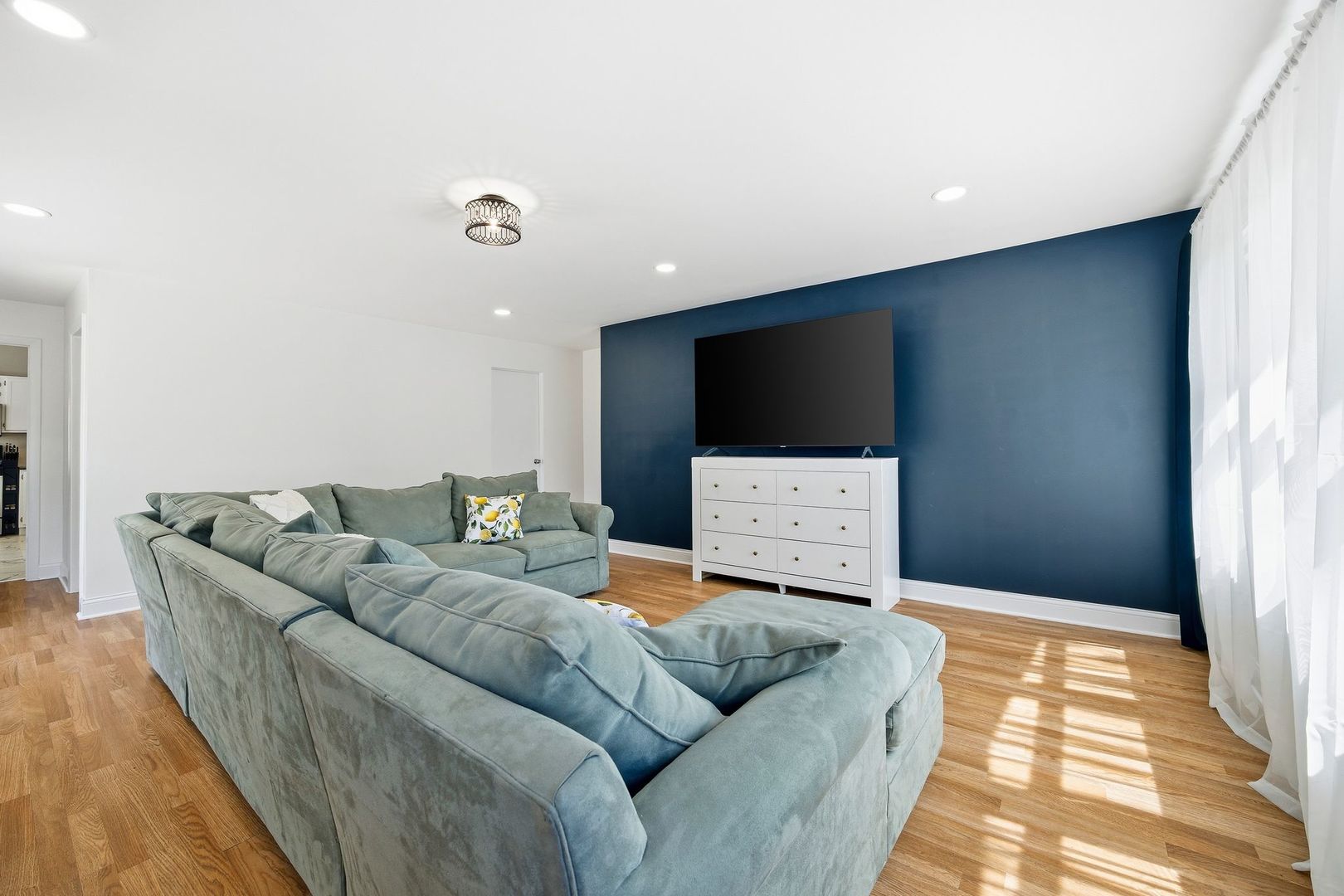 2117 Grouse Lane Rolling Meadows, IL 60008 - Photo 12 of 25 a living room with furniture and a flat screen tv