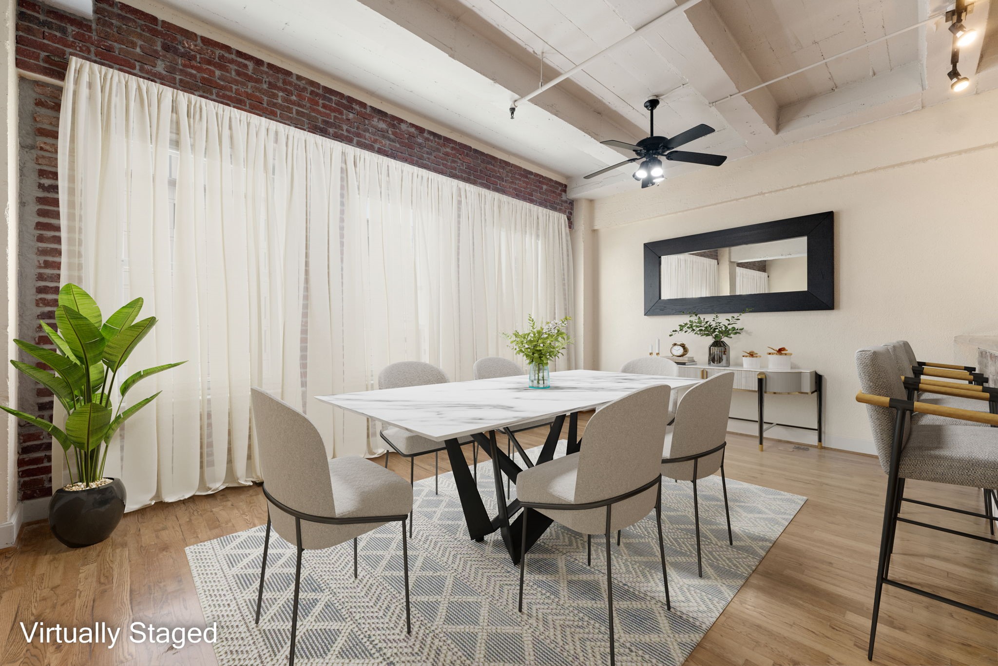 1120 Texas Street, Unit 7D Houston, TX 77002 - Photo 12 of 28 a view of a dining room with furniture and a potted plant