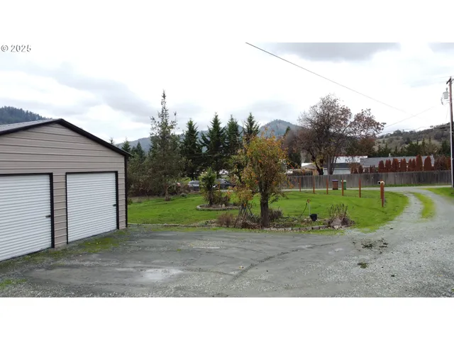 a black and white photo of a house