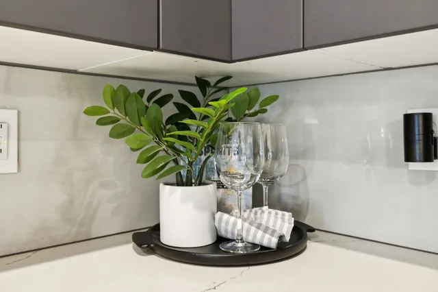 a bathroom with double vanity sink and a mirror