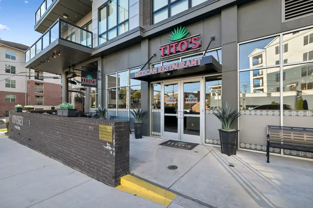 a view of a street with shops
