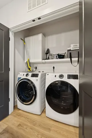 a balcony view with a seating space