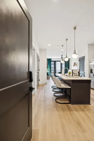 a white stove top oven sitting inside of a kitchen
