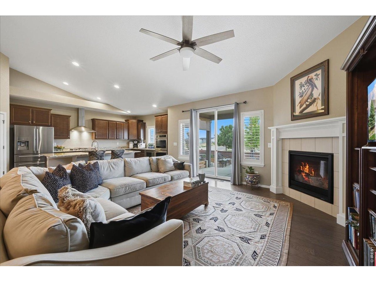 6096 Story Road Timnath, CO 80547 - Photo 7 of 50 a living room with furniture and a fireplace