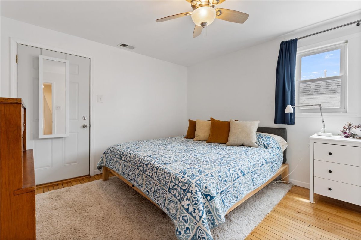 2735 North Ridgeway Avenue Chicago, IL 60647 - Photo 14 of 40 a bedroom with a bed and window