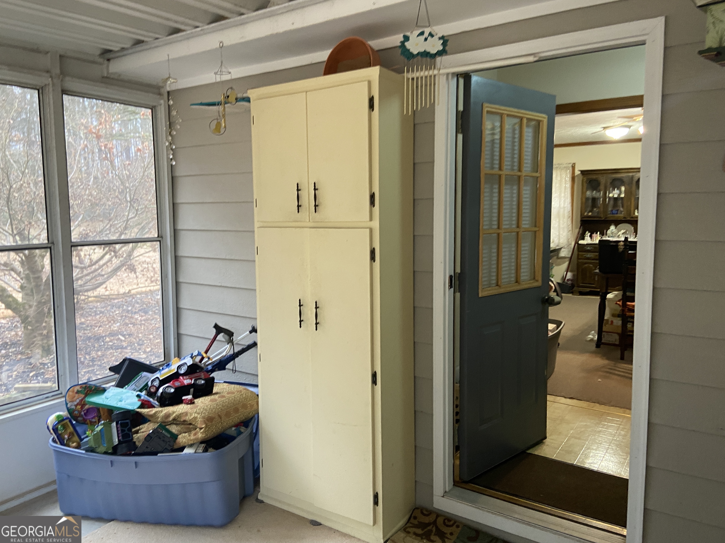 1309 Tom Miller Road Bethlehem, GA 30620 - Photo 18 of 32 a living room with furniture and a window