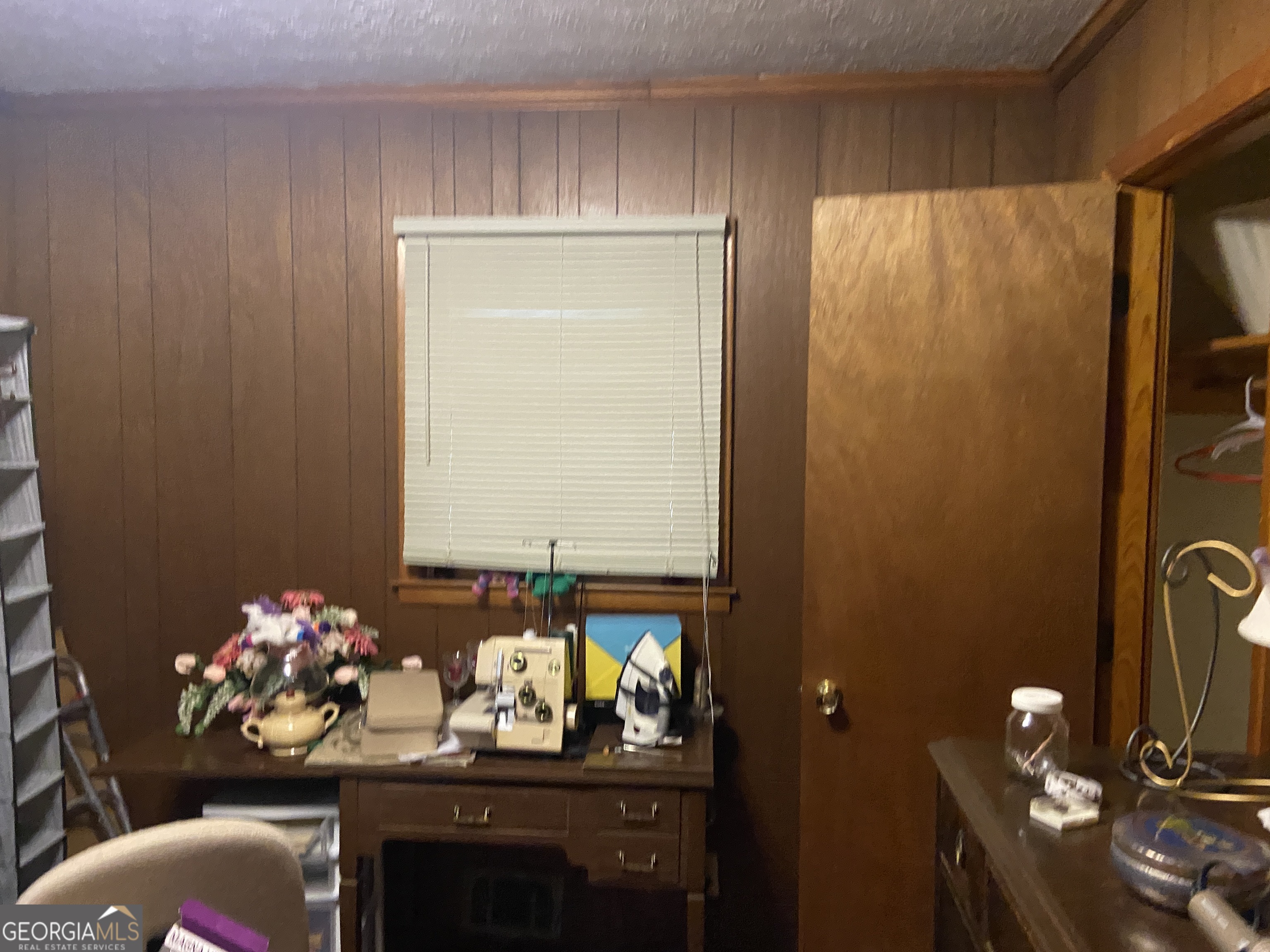 1309 Tom Miller Road Bethlehem, GA 30620 - Photo 22 of 32 a bathroom with a sink mirror and vanity