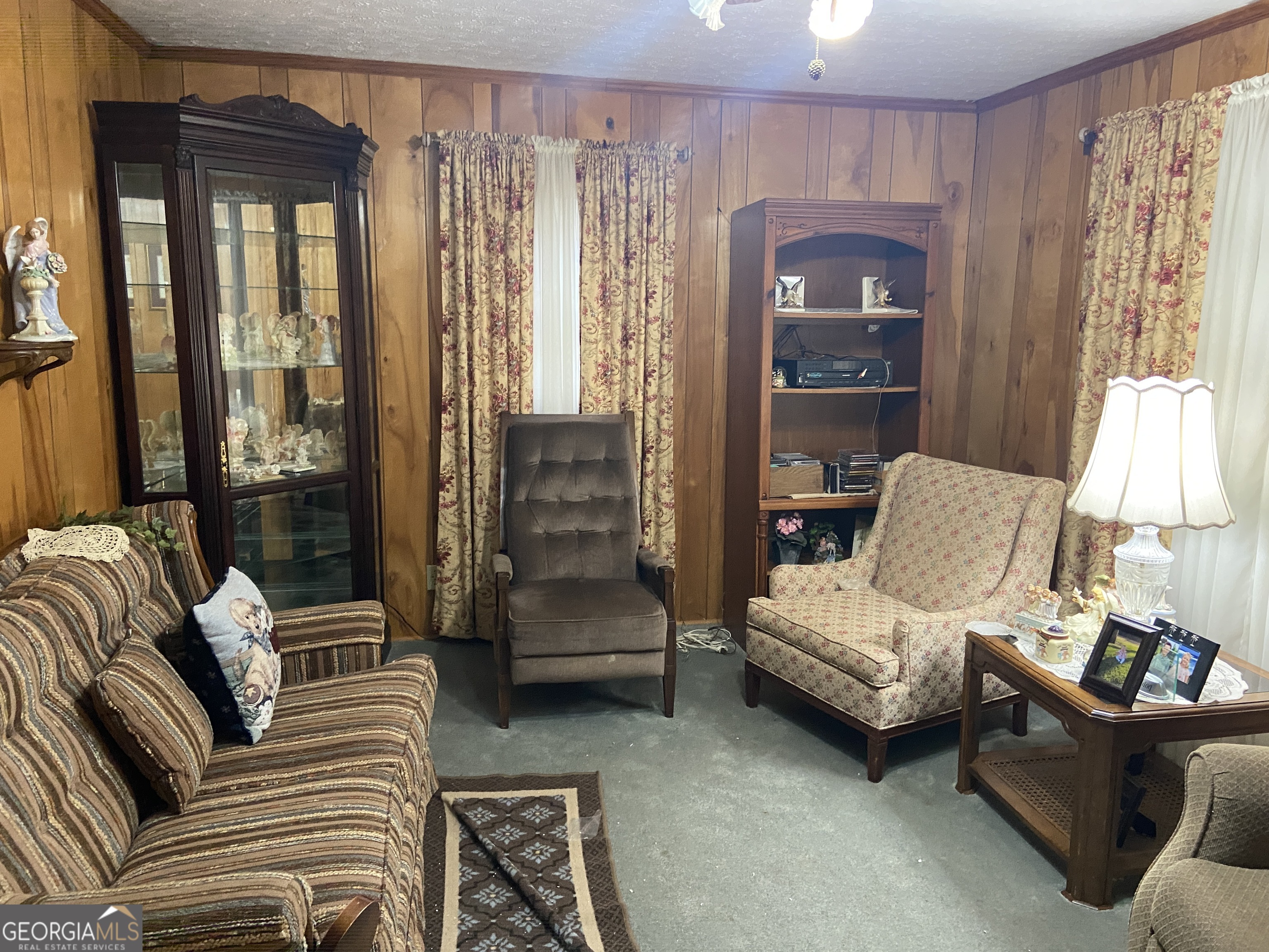 1309 Tom Miller Road Bethlehem, GA 30620 - Photo 28 of 32 a living room with furniture and a large window