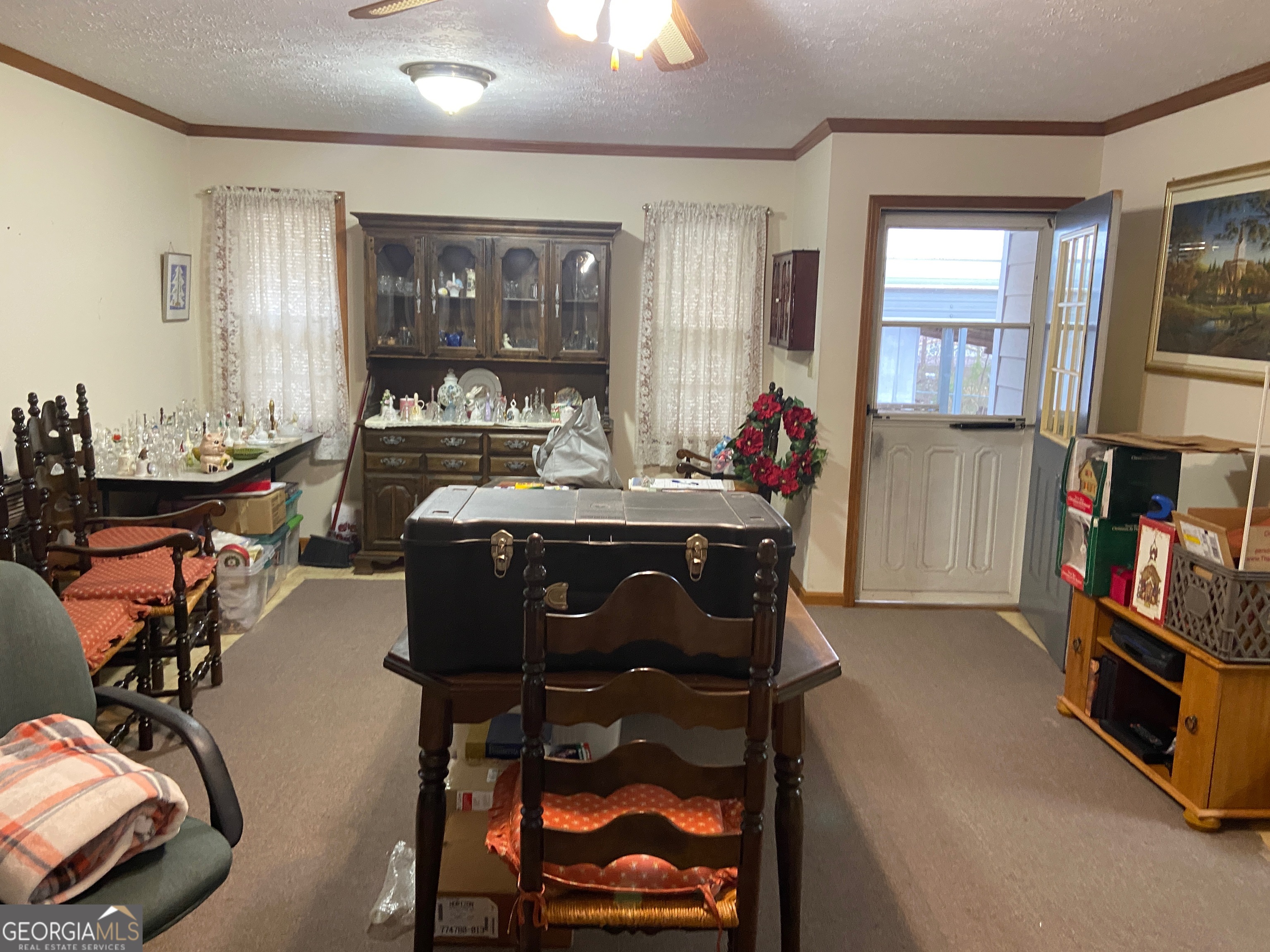 1309 Tom Miller Road Bethlehem, GA 30620 - Photo 9 of 32 a dining room with furniture and window