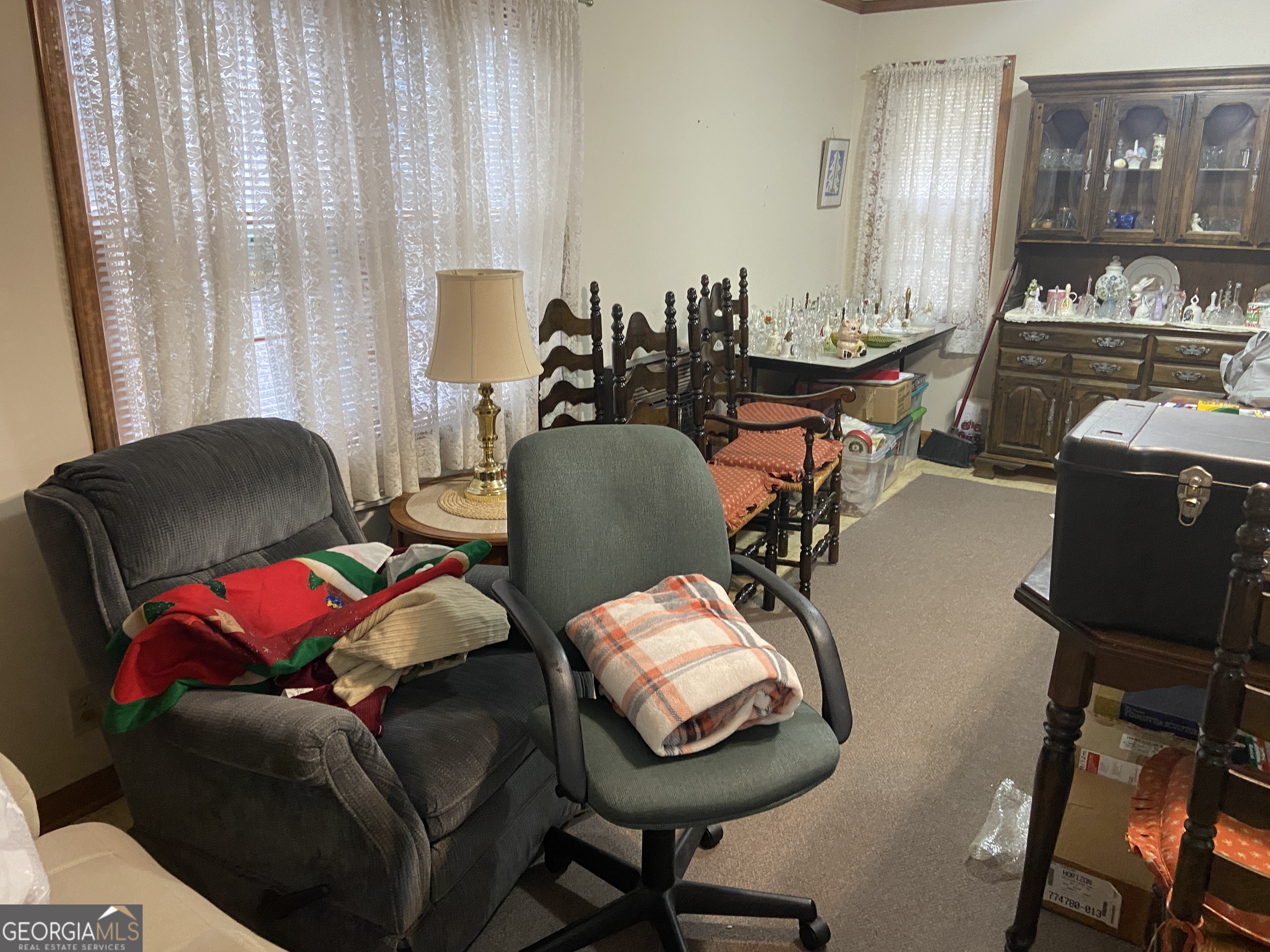 1309 Tom Miller Road Bethlehem, GA 30620 - Photo 10 of 32 a living room with furniture and a mirror