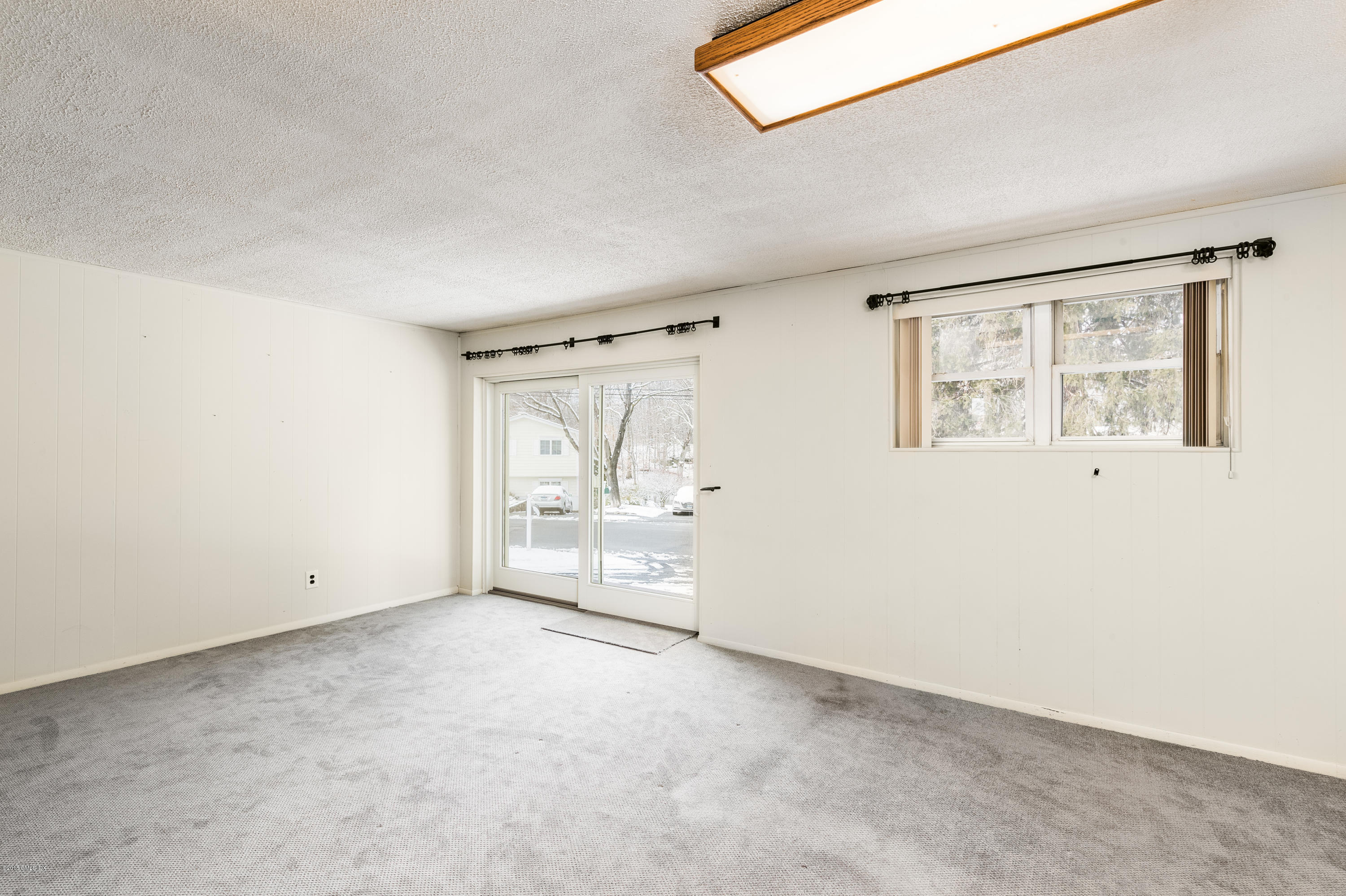 80 Mary Lane Riverside, CT 06878 - Photo 11 of 15 an empty room with windows