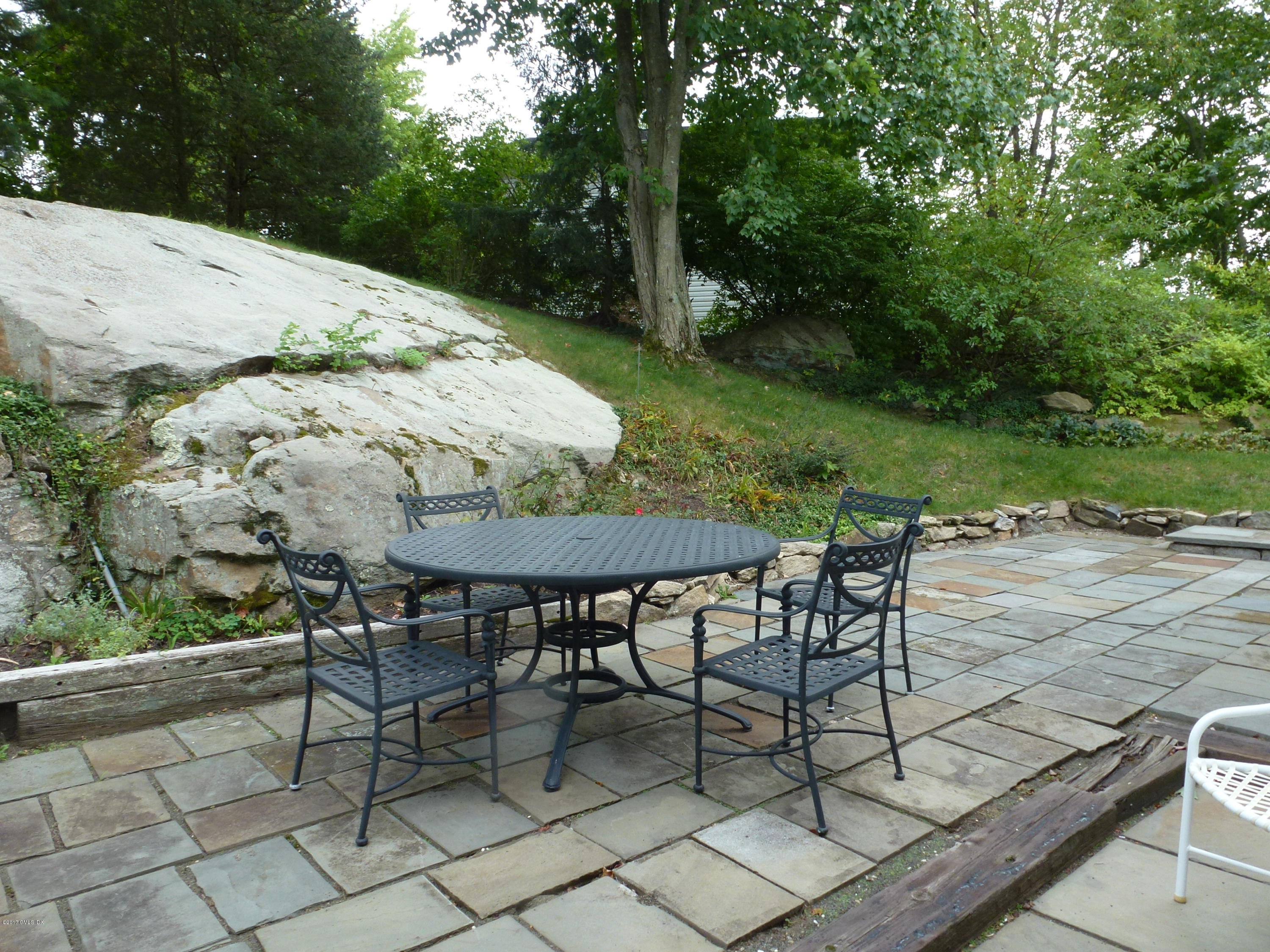 80 Mary Lane Riverside, CT 06878 - Photo 14 of 15 a view of an outdoor space with table and chairs