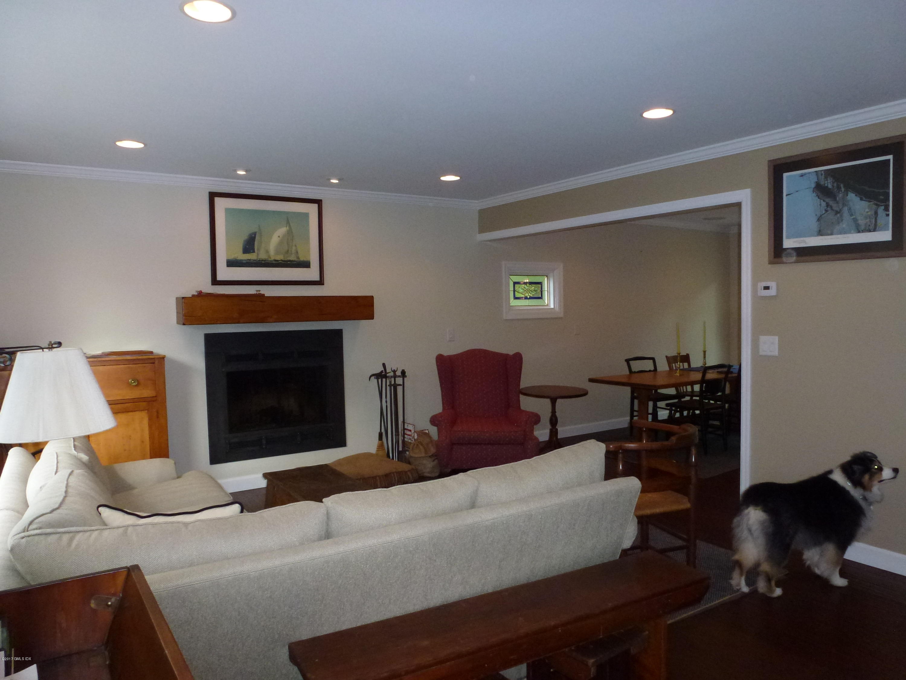 80 Mary Lane Riverside, CT 06878 - Photo 4 of 15 a living room with furniture and a fireplace