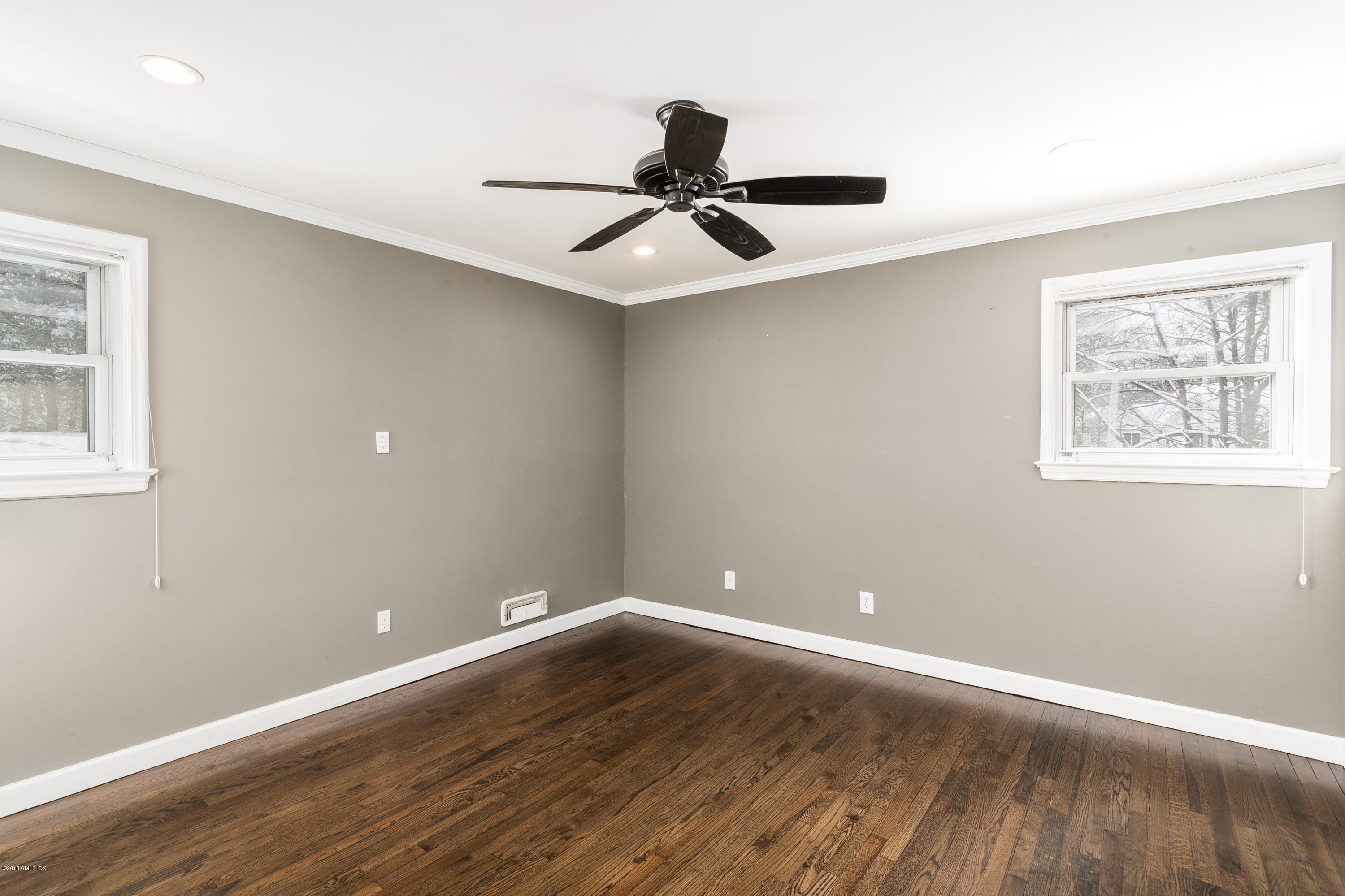 80 Mary Lane Riverside, CT 06878 - Photo 7 of 15 a view of an empty room with wooden floor and a window