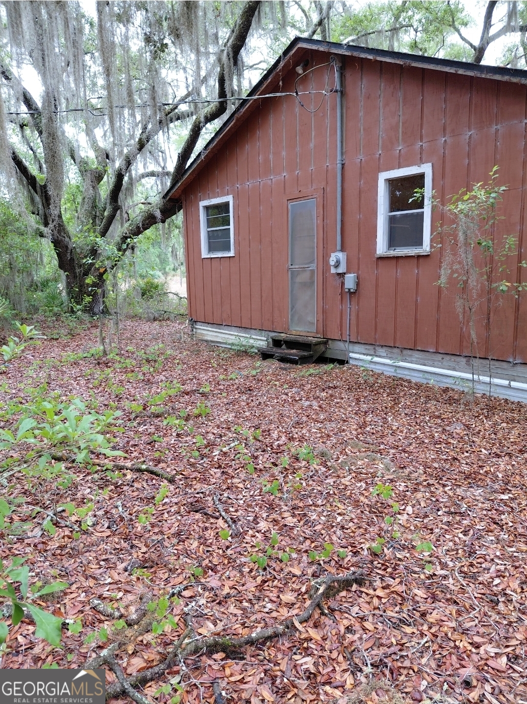 779 Ralph Davis Road, Unit 1 LAND LOT Folkston, GA 31537 - Photo 24 of 28 a backyard of a house with lots of green space