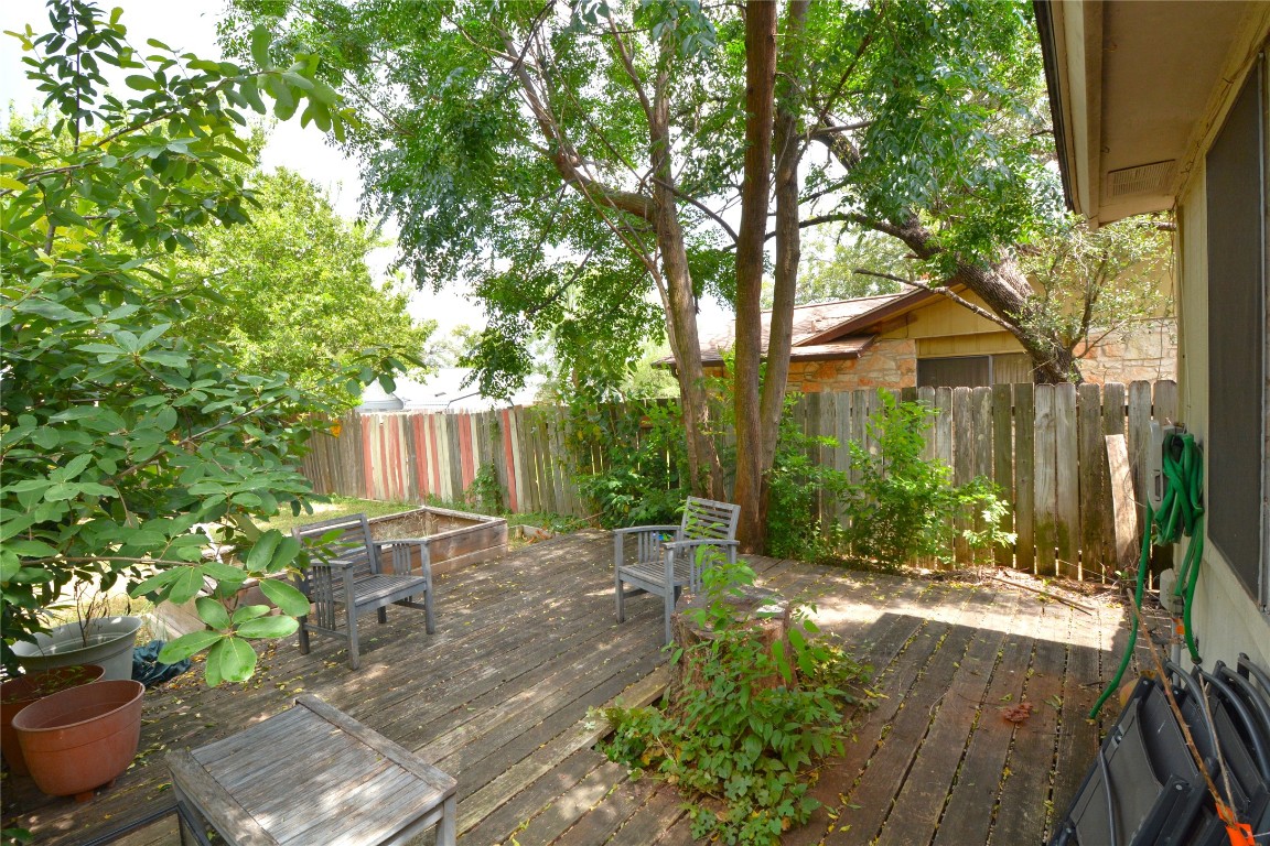 12327 Deerbrook Trail Austin, TX 78750 - Photo 20 of 20 a view of a house with a yard and large tree